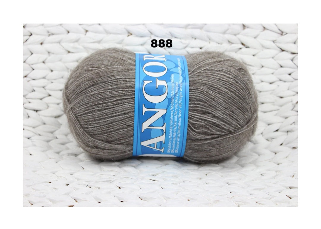 Mohēras tops ar kuplām piedurknēm