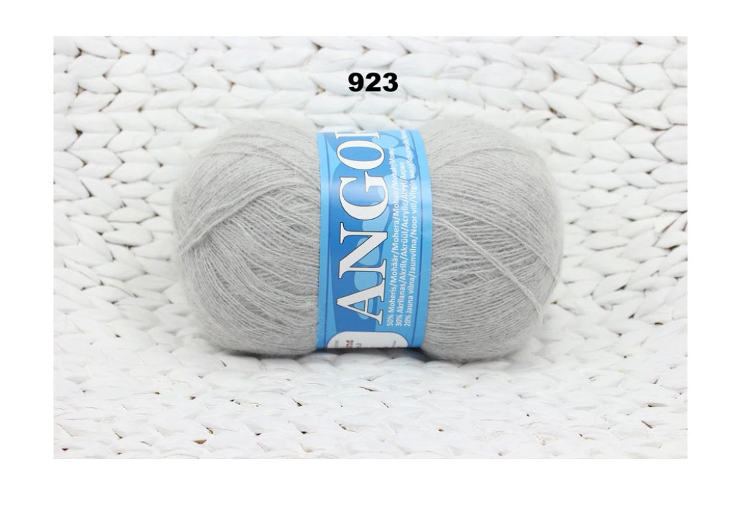 Mohēras tops ar kuplām piedurknēm