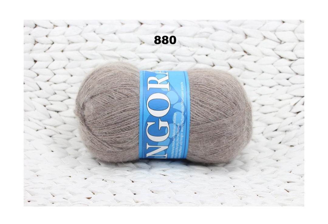 Mohēras tops ar kuplām piedurknēm