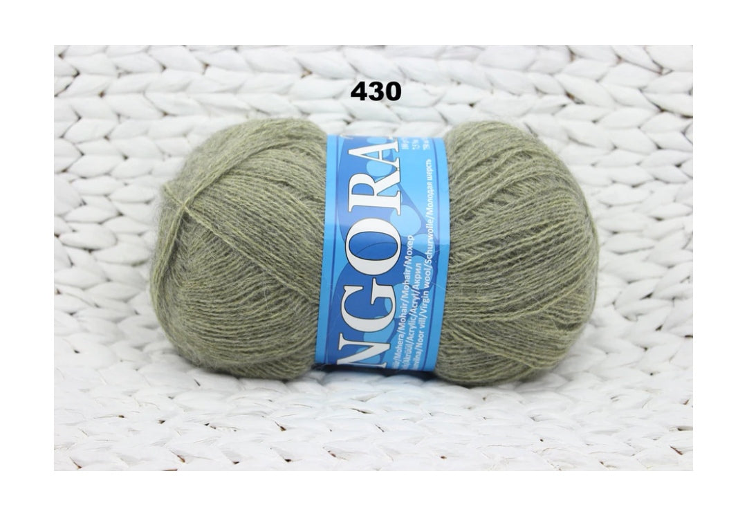 Mohēras tops ar kuplām piedurknēm