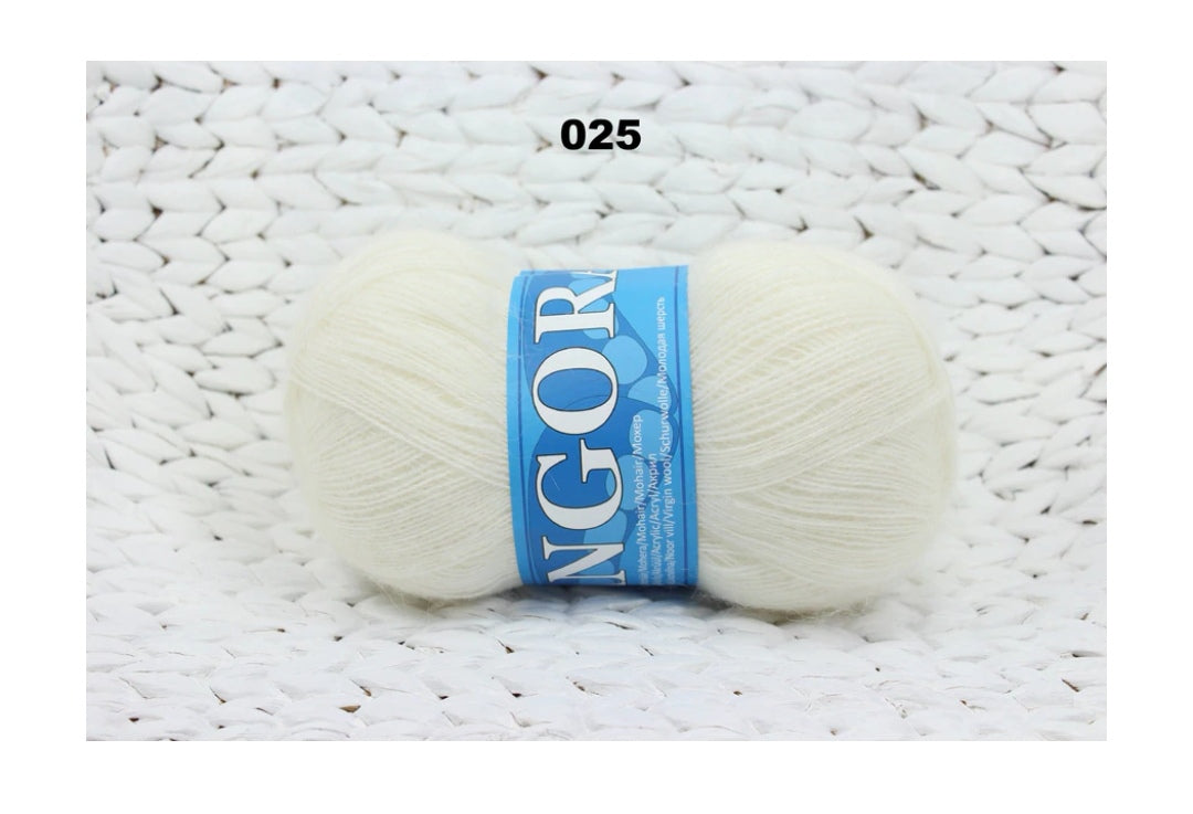 Mohēras tops ar kuplām piedurknēm