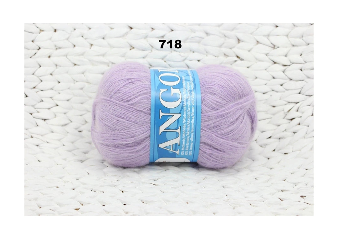 Mohēras tops ar kuplām piedurknēm