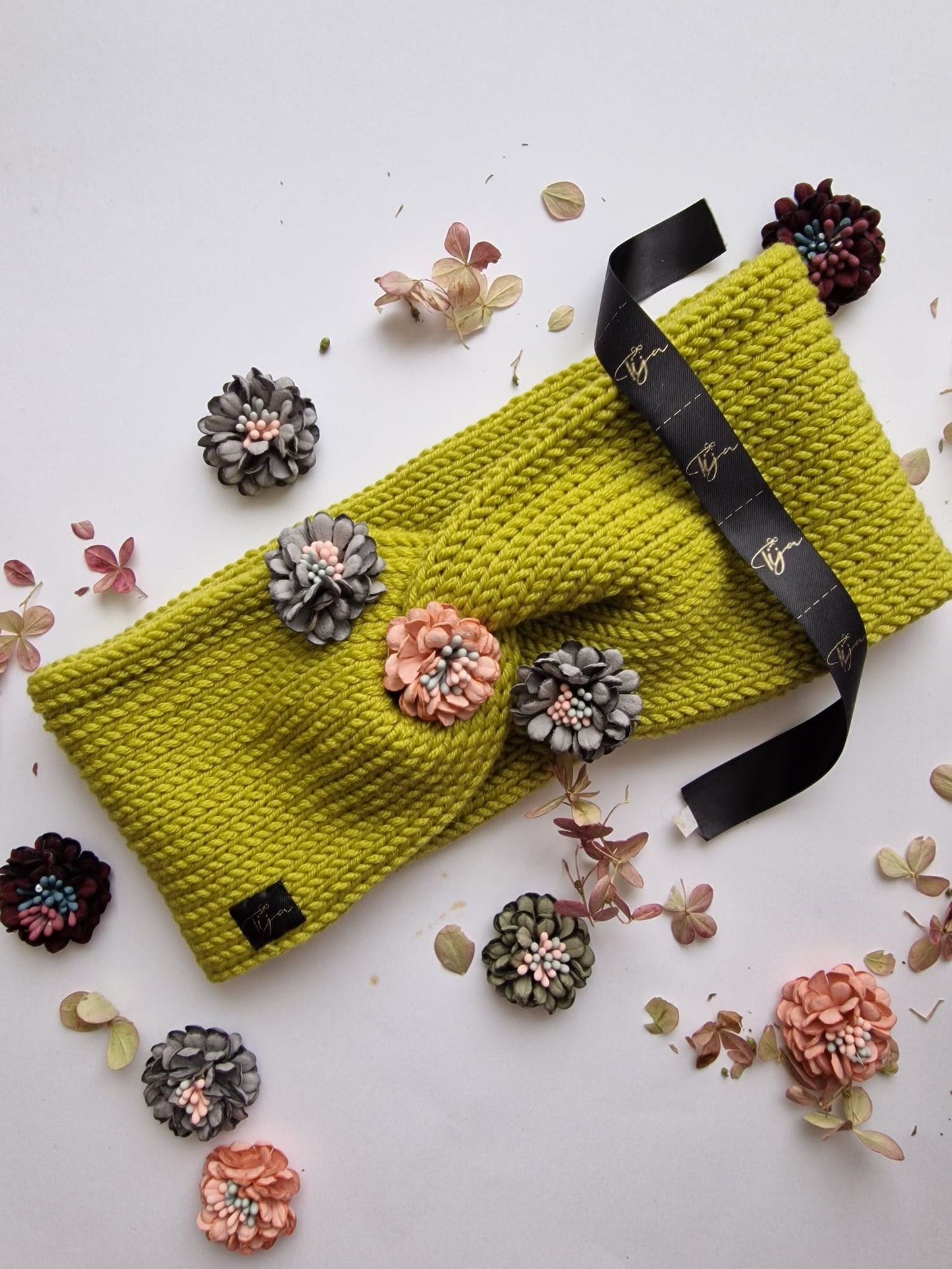 Merino ausaines ar puķītēm