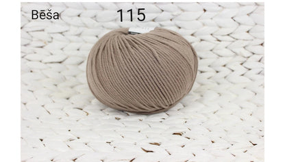 Newborn socks with a cable